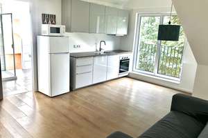 Helle 2-Zi Dachgeschosswohnung mit West- Balkon 