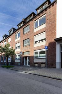 Attraktives Mehrfamilienhaus mit starkem Mietpotenzial in zentraler Lage und Garten