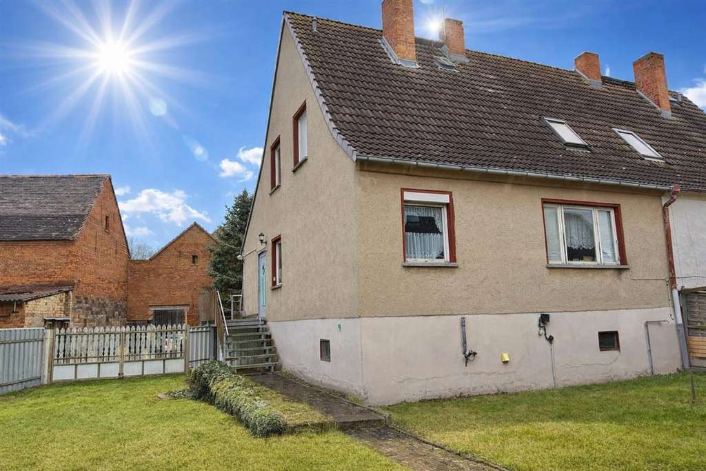 Immobilie in Reinsdorf - DHH mit Keller und Brunnen in idyllischer, dörflicher Lage mit guter Verkehrsanbindung - Bild 1