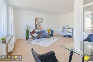 Saniert. Vier-Zimmer-Wohnung mit Balkon und Tiefgaragenstellplatz.