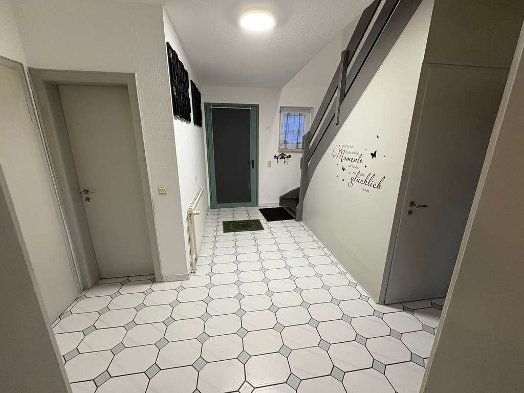 Immobilie in Xanten - Gepflegte Doppelhaushälfte mit Garage in Xanten-Lüttingen - Bild 1