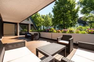 Mit Umbauoption nach Wunsch: Retro-Terrassenhaus Wohnung in bester Marienburger Lage