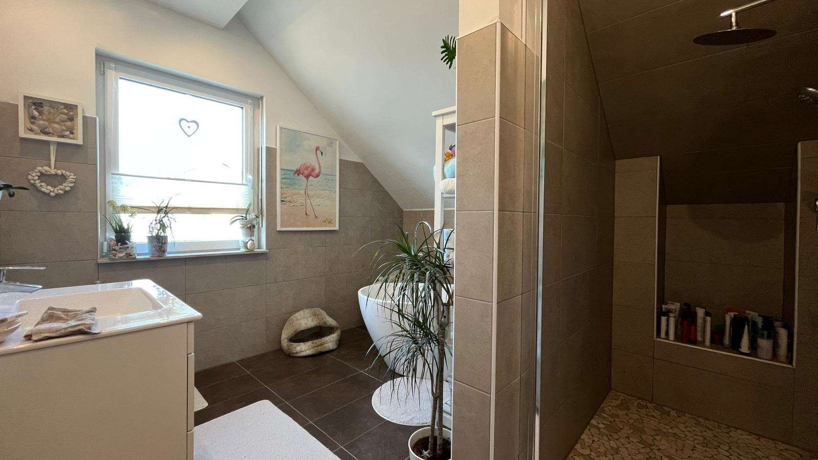 Immobilie in Dolgesheim - Einziehen & Wohlfühlen: Hochwertiges Wohnen auf zwei Etagen - Bild 4