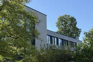 Neubau eines der schönsten Reihenhäuser Münchens mit traumhafter Dachterrasse