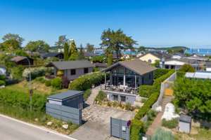Design-Ferienhaus mit Sauna, Kamin & Wasserblick