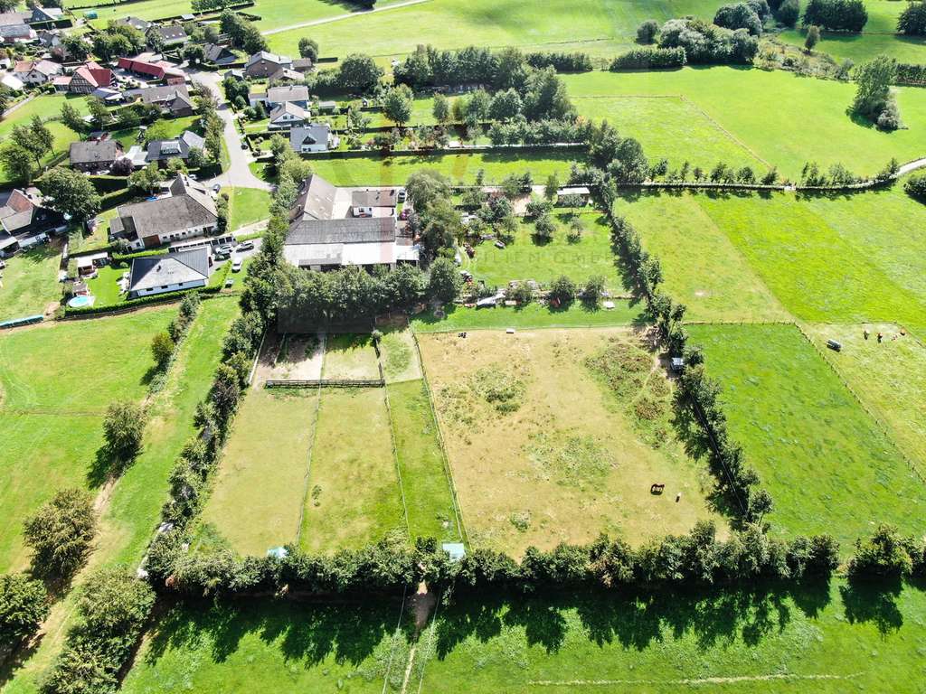 Immobilie in Simmerath - Modernisiertes Anwesen mit 7 Wohnungen, Stallungen & großem Grundstück – Potenzial für 9–10 WE - Bild 1