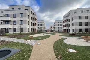 ++ 4-Zimmer-Neubauwohnung mit großzügigem Garten I EBK I 2 Terrassen I PKW-Stellplatz