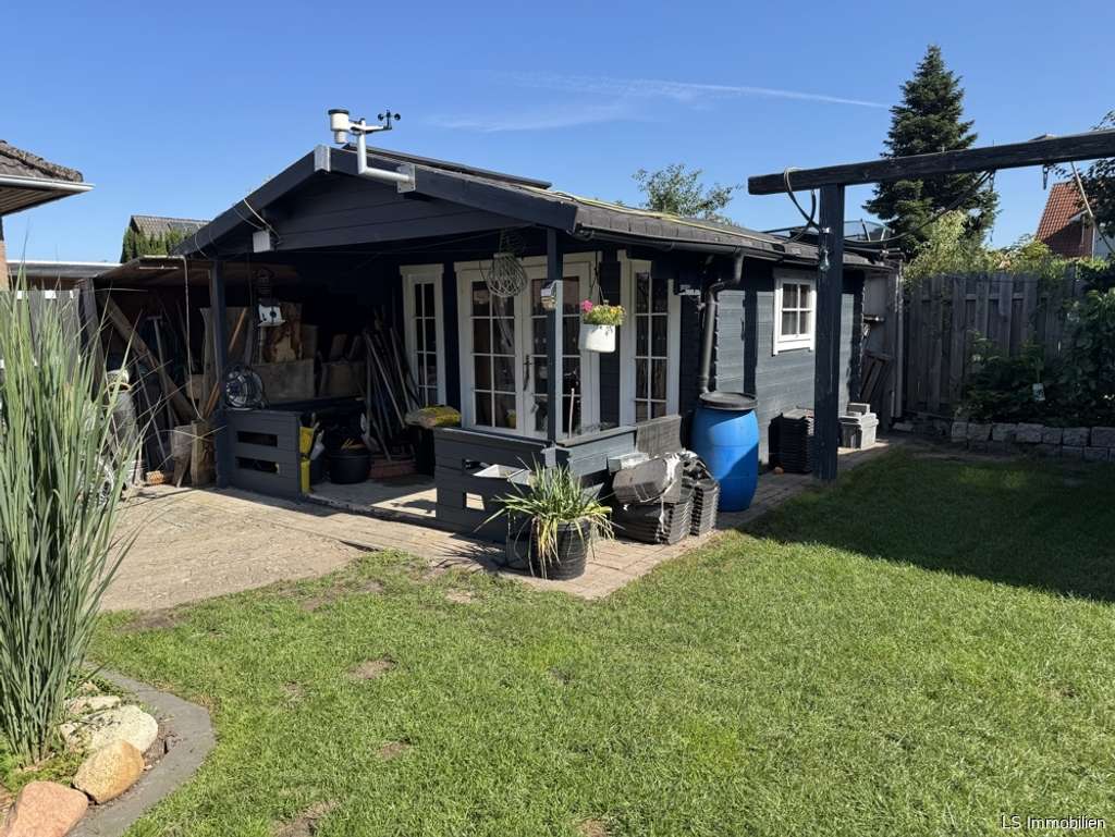 Immobilie in Wiefelstede - Großzügiges Haus mit Remise und Outdoorküche - Bild 2