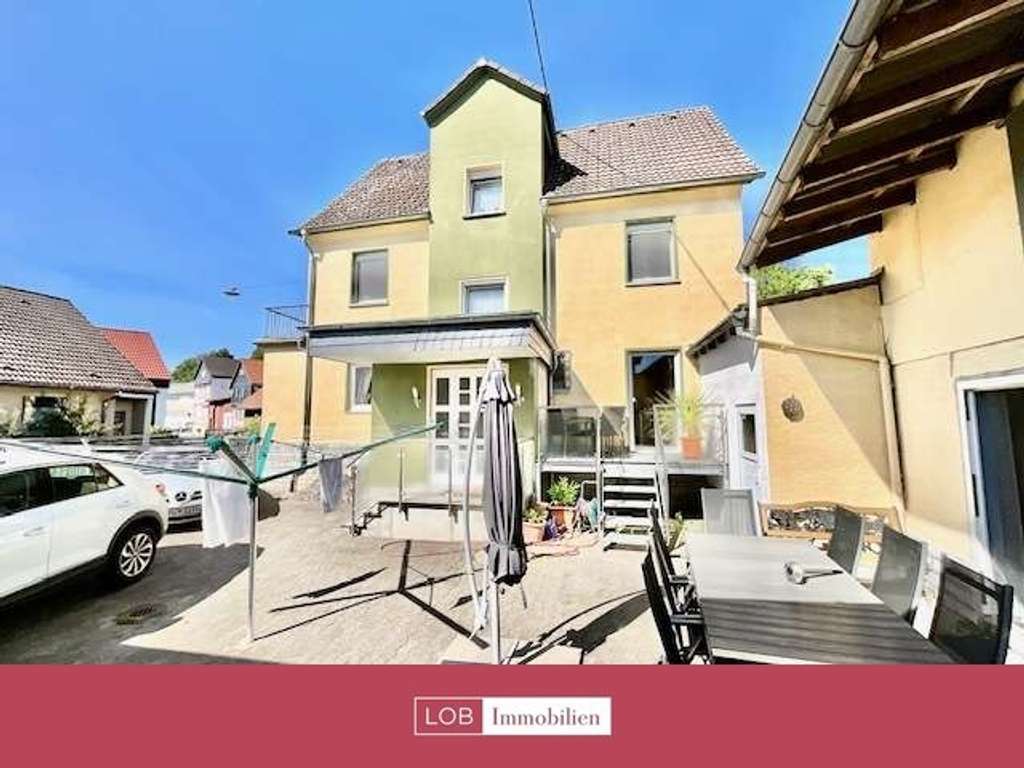 Immobilie in Butzbach - Massiv erbautes Einfamilienhaus mit großem Platzangebot für die Familie / 168 Qm Wfl. - Bild 2