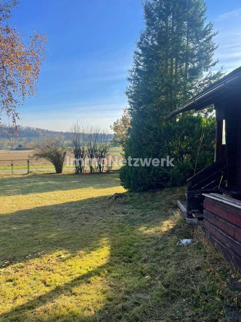 Grundstück mit Blockbohlenhaus am Trappenberg