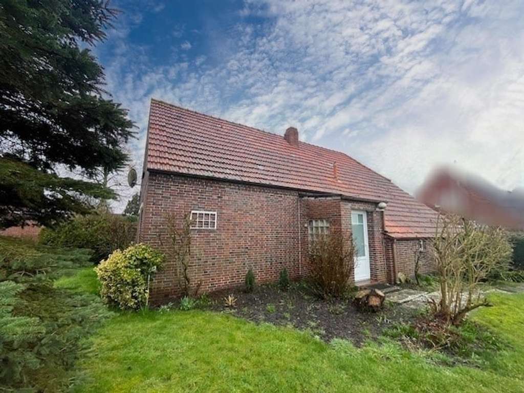 Immobilie in Hagermarsch - Natur und Weite - Landarbeiterhaus mit Carport in Hagermarsch - Ostfriesische Nordseeküste - Bild 1