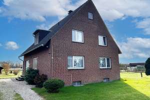 Vermietetes Zweifamilienhaus mit Gartenanteilen und zwei Garagen im ländlichen Außenbereich! – Die vollständige Adresse der Immobilie erhältst du vom Anbieter., 46514 Schermbeck – Vorschaubild 1