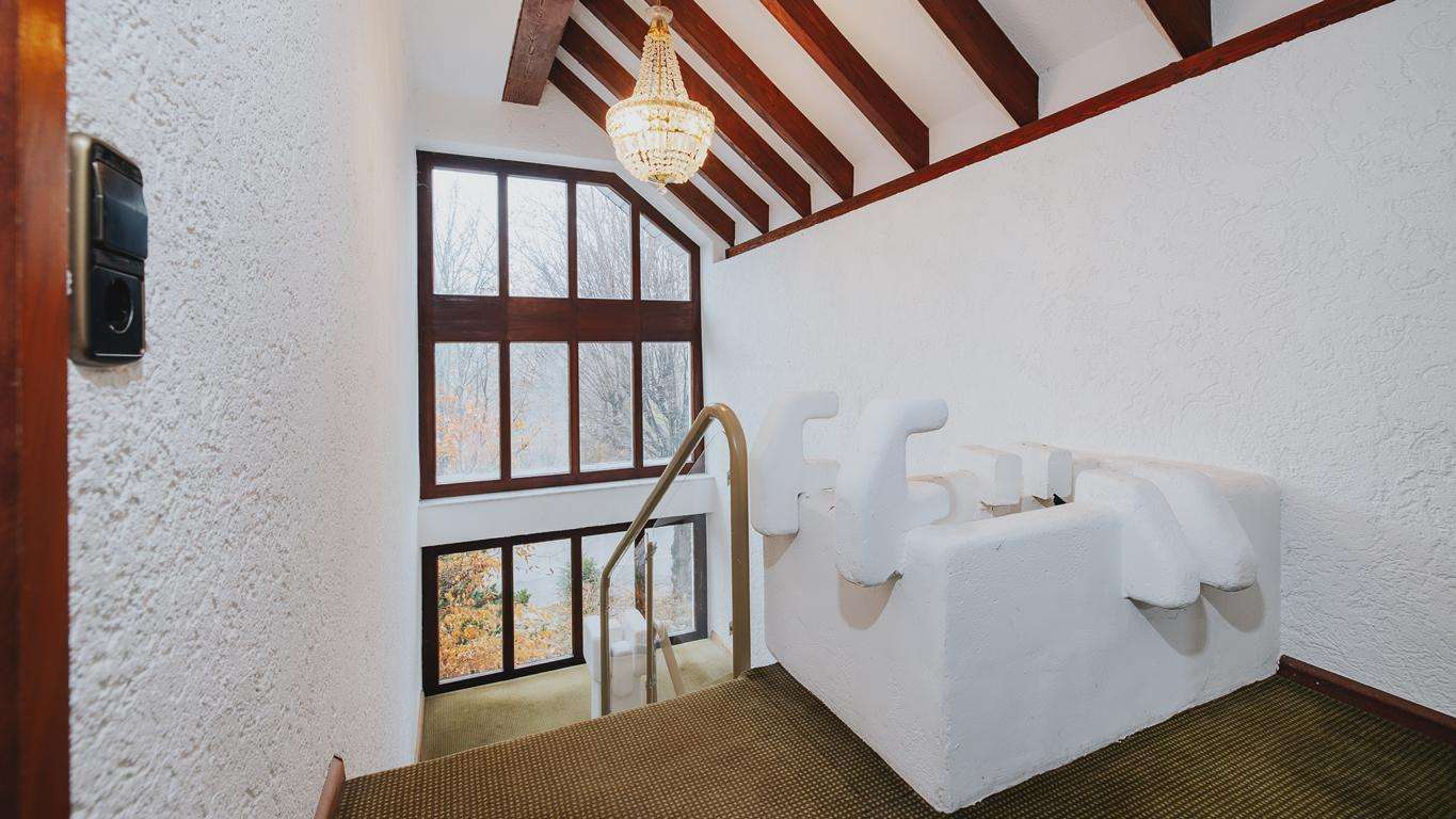 Immobilie in Breisach am Rhein - Vielseitig nutzbares Einfamilienhaus mit Büroeinheit und Einliegerwohnung in Breisach-Hochstetten - Bild 8