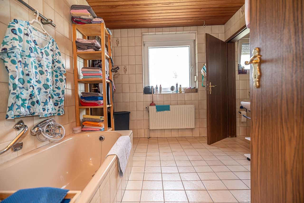 Immobilie in Zetel - Vielseitige Nutzung im Herzen Zetels - Bild 6