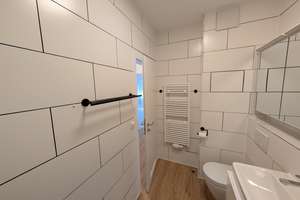Erstbezug nach Renovierung: helle 1,5-Zimmer-Wohnung mit großer West-Dachterrasse in München-Solln – Wolfratshauser Straße 135a, 81479 Thalkirchen, München – Vorschaubild 4