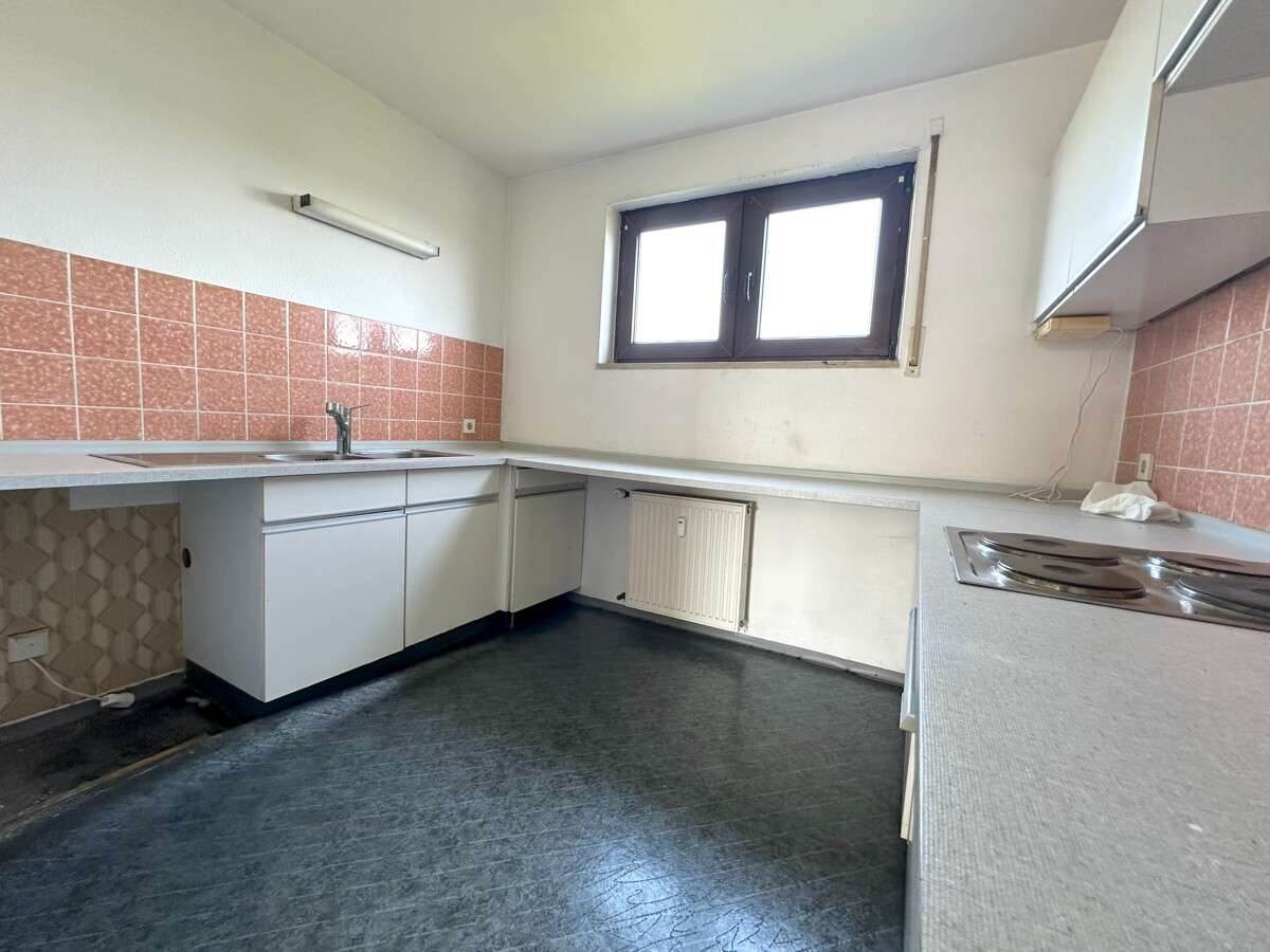 Immobilie in Wörth am Rhein - Helle 3-Zimmer Eigentumswohnung mit Balkon und Stellplatz in attraktiver Lage von Maximiliansau - Bild 5