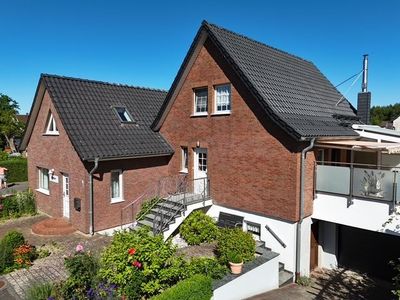 Einfamilienhaus mit Gewerbeanbau in Diekhof