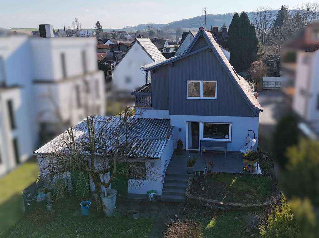 Immobilie in Roßdorf - Charmantes Zweifamilienhaus mit großem Grundstück in ruhiger und zentraler Lage von Roßdorf - Bild 3