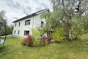 Repräsentatives Haus mit 278 m², 11 Zimmern, Einliegerwohnung, Terrassen, Garten & Weitblick – moder