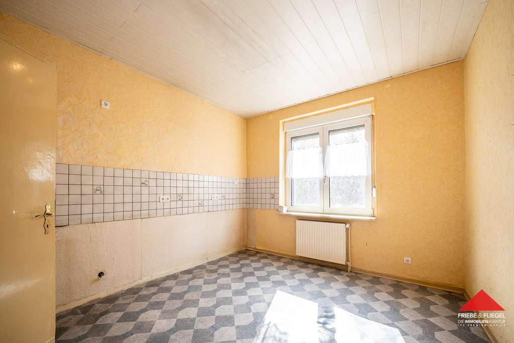 Immobilie in Dortmund - Einfamilienhaus mit Anbau und zwei Kfz-Stellplätzen in ruhiger Sackgassenlage - Bild 1