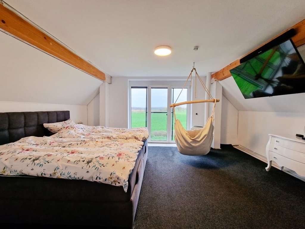 Immobilie in Tellingstedt - Kernsaniertes Einfamilienhaus mit großem Grundstück & Naturblick - Bild 4