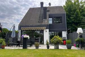 Einfamilienhaus mit Einliegerwohnung und zwei Garagen – Die vollständige Adresse der Immobilie erhältst du vom Anbieter., 40882 Homberg, Ratingen – Vorschaubild 1
