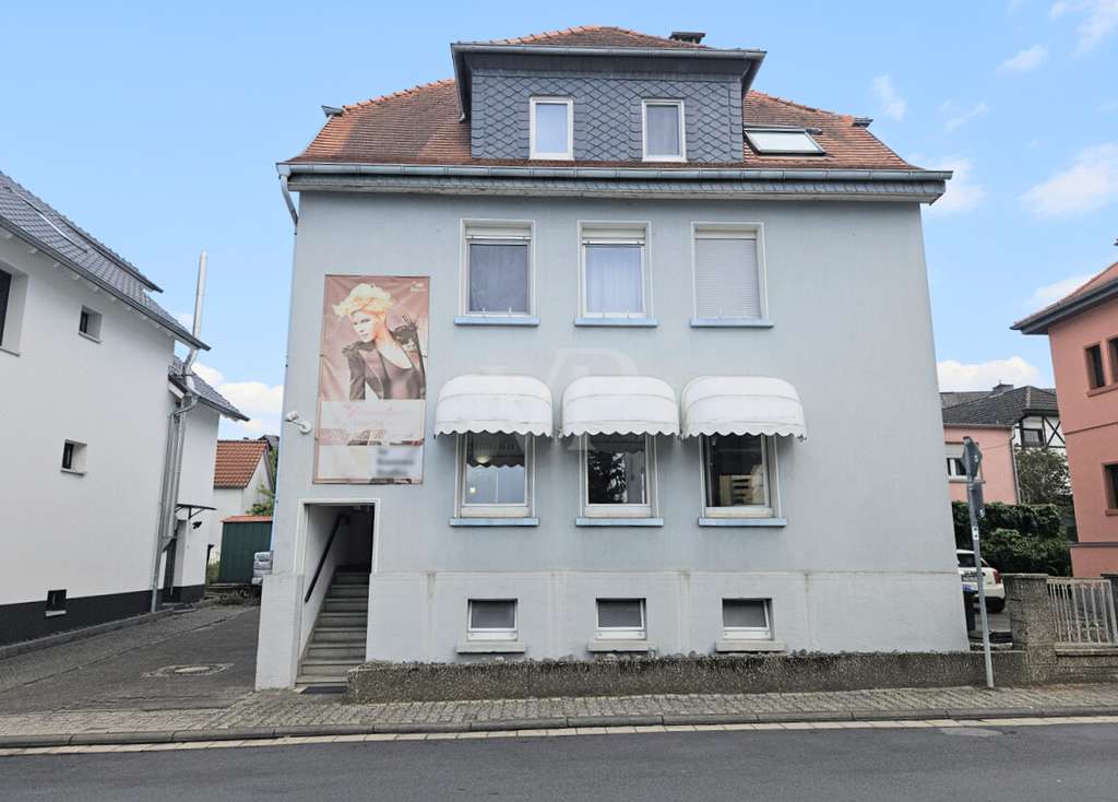 Immobilie in Neu-Anspach - Wohnen und Arbeiten unter einem Dach: Wohn- und Geschäftshaus in zentraler Lage von Neu-Anspach - Bild 0