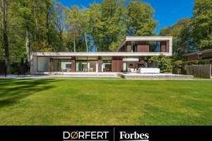 Architektonisches Statement im Grünen und preisgekrönte Villa - „Haus am Park"