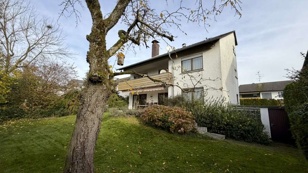 Immobilie in Kriftel - METZ IMMOBILIEN - Mehrfamilienhaus mit freier Erdgeschosswohnung und Garten - Bild 1