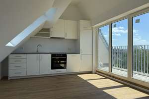 Erstbezug Dachgeschosswohnung mit Balkon in Köln-Rodenkirchen mit neuer Einbauküche