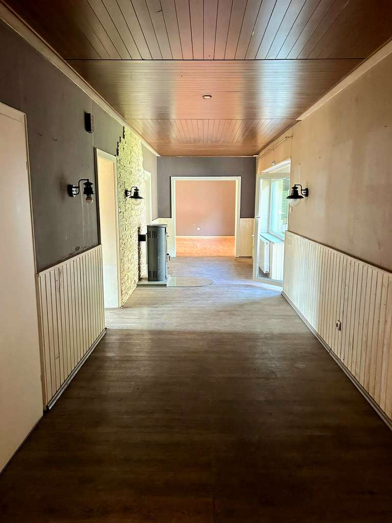 Immobilie in Lauterecken - Wohnen, wo andere Urlaub machen: Freistehender Bungalow mit verwunschenem Garten und Weitblick - Bild 4