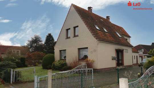 Bild von Immobilie mit vielseitigen Verwendungsmöglichkeiten und Baugrundstück 