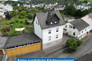 2-Familienhaus (eine Whg. vermietet) mit Werkstatt und 8 Garagen auf Traumgrundstück – Limburg-Weilburg (Kreis) – Vorschaubild 1
