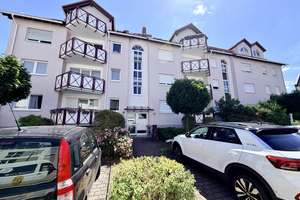 ***Gepflegte 2-Zimmer-Erdgeschosswohnung mit Südwest-Balkon und TG-Stellplatz – sofort frei*** – 63225 Langen (Hessen) – Vorschaubild 1