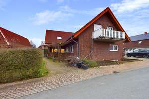 TOP-INVESTMENT: FAMILIENFREUNDLICHES MFH IN SACKGASSENLAGE MIT GARTEN, TERRASSE, BALKONEN & GARAGEN! – Die vollständige Adresse der Immobilie erhältst du vom Anbieter., 49434 Neuenkirchen-Vörden – Vorschaubild 3