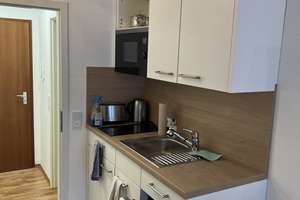 Schöne, möbilierte 1,5-Zimmer- Wohnungen mit EBK in Unterschleißheim – Pater-Kolbe-Straße 5, 85716 Unterschleißheim – Vorschaubild 2
