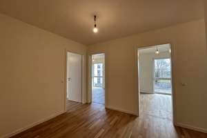 KfW 40-Neubau-Wohnung mit EBK, Südbalkon, Echtholzparkett, Fahrstuhl, Tiefgarage – Berringerstraße 36, 18146 Dierkow-Neu, Rostock – Vorschaubild 2