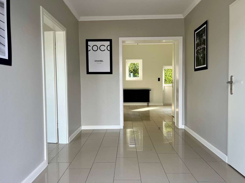 Immobilie in Bad Nenndorf - Stillvoll renovierte Erdgeschosswohnung mit großem Garten in idyllischer Feldrandlage! - Bild 0