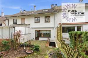 Gemütliches Reihenhaus zur Sanierung mit Garten und Garage