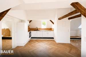 Außergewöhnliche Studio-Dachgeschosswohnung mit großer Dachterrasse