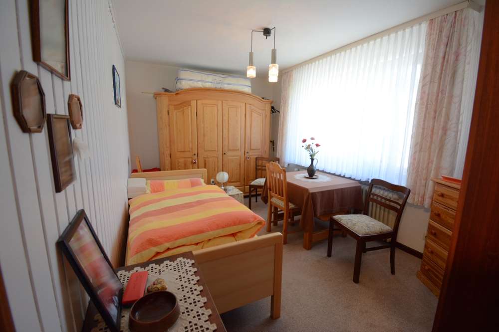 Immobilie in Weddingstedt - Großzügiger Winkelbungalow in ruhiger Wohnlage mit Ausbaureserve und gepflegtem Garten - Bild 6