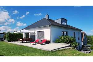 Wohnen im Grünen: 3-Zimmer-Wohnung mit Terrasse und Garten