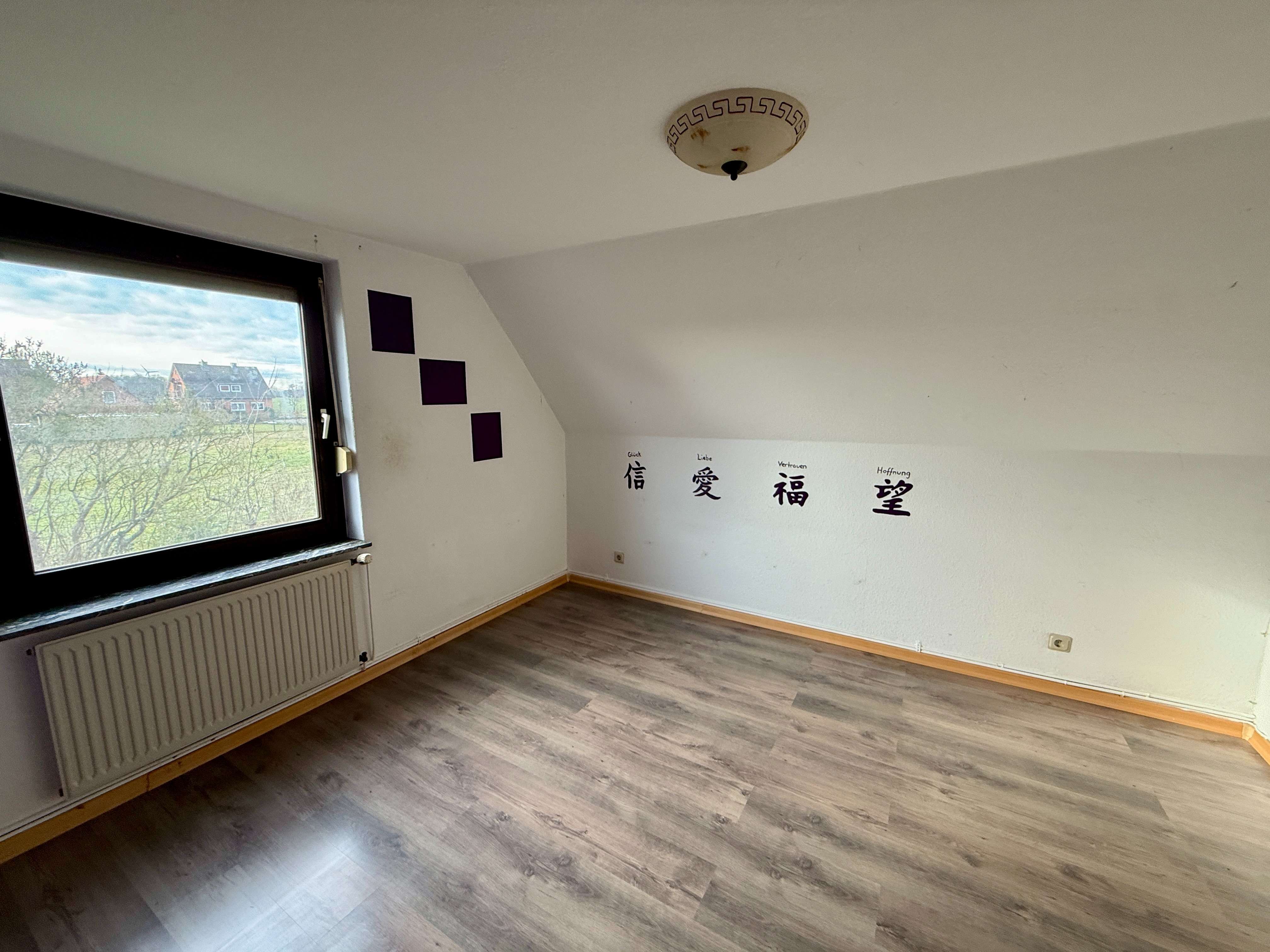 Immobilie in Wietzen - Modernisiertes Zweifamilienhaus mit Einliegerwohnung, Specksteinofen und PV Anlage in Wietzen! - Bild 7