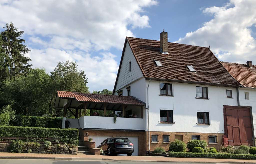 Immobilie in Hofgeismar - Gemütliche Doppelhaushälfte  mit 2 Wohnungen in Hofgeismar OT Carlsdorf - Bild 0