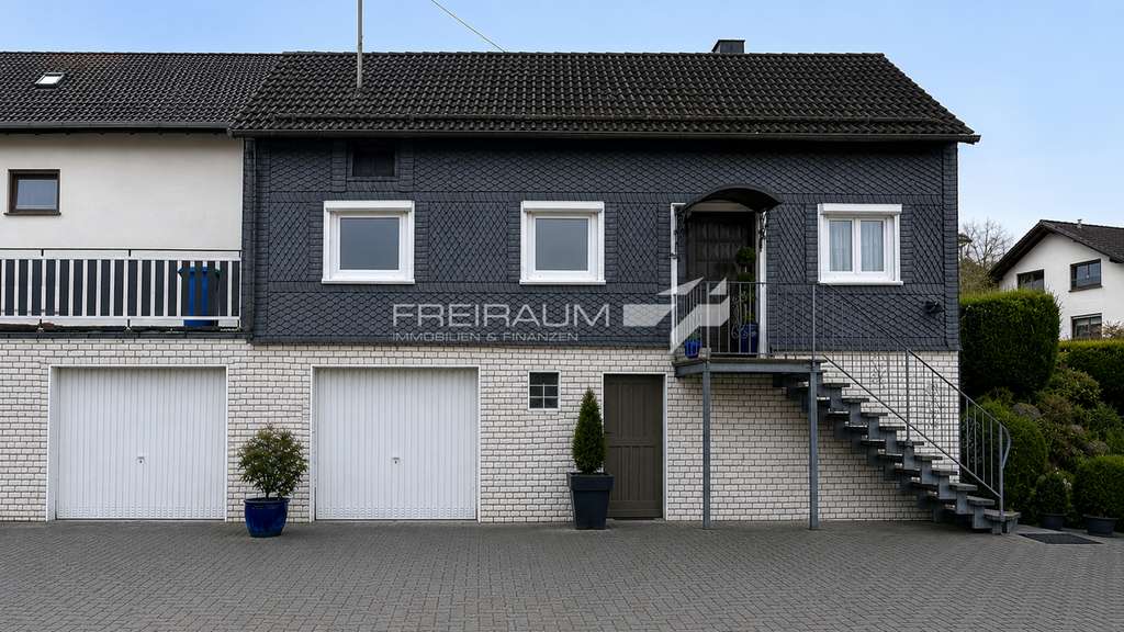 Immobilie in Wilnsdorf - Freiraum4 +++ Charmantes Einfamilienhaus mit großem Grundstück & zusätzlichem Ackerland in Wilnsdorf - Bild 0