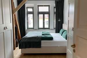 Stilvolles Wohnen über den Dächern: Exklusive 3-Zimmer-DG-Wohnung bezugsfertig möbliert gegen Ablöse – St.-Bonifatius-Str. 1, 81541 Obergiesing, München – Vorschaubild 5