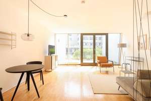 Souterrain-Wohnung mit sonniger Terrasse - Möbliert