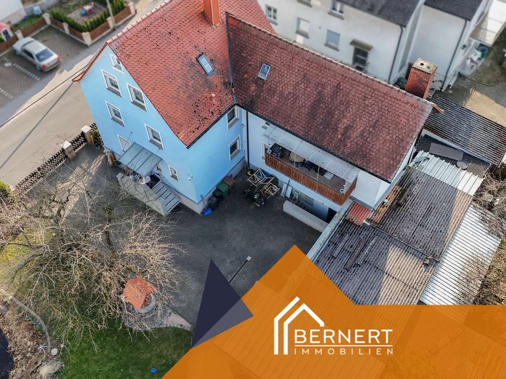 Immobilie in Gundelsheim - Großzügiges Mehrfamilienhaus mit Doppelgarage, Gartenidylle und vielseitigem Nutzungspotenzial - Bild 2