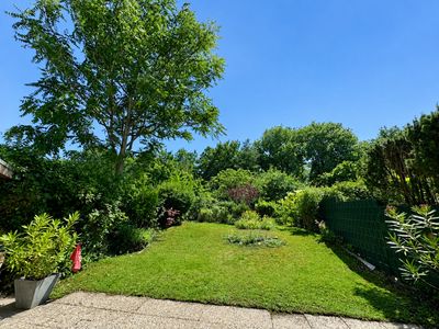 Charmante Doppelhaushälfte mit Traumgarten in ruhiger Waldrandlage