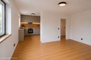 AIGNER - Sonnige 2-Zimmer Gartenwohnung mit Balkon und schönem Süd-West-Garten
